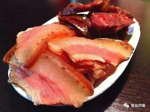 湖南人将猪肉腌制、熏烤后制成腊肉