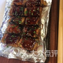 铁板烧汁茄条，是一道以茄子为主料